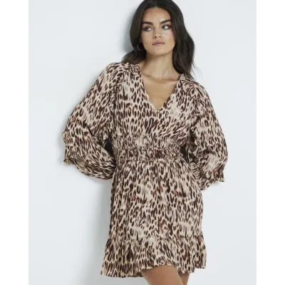 Beige leopard print frill swing mini dress sold by River Island