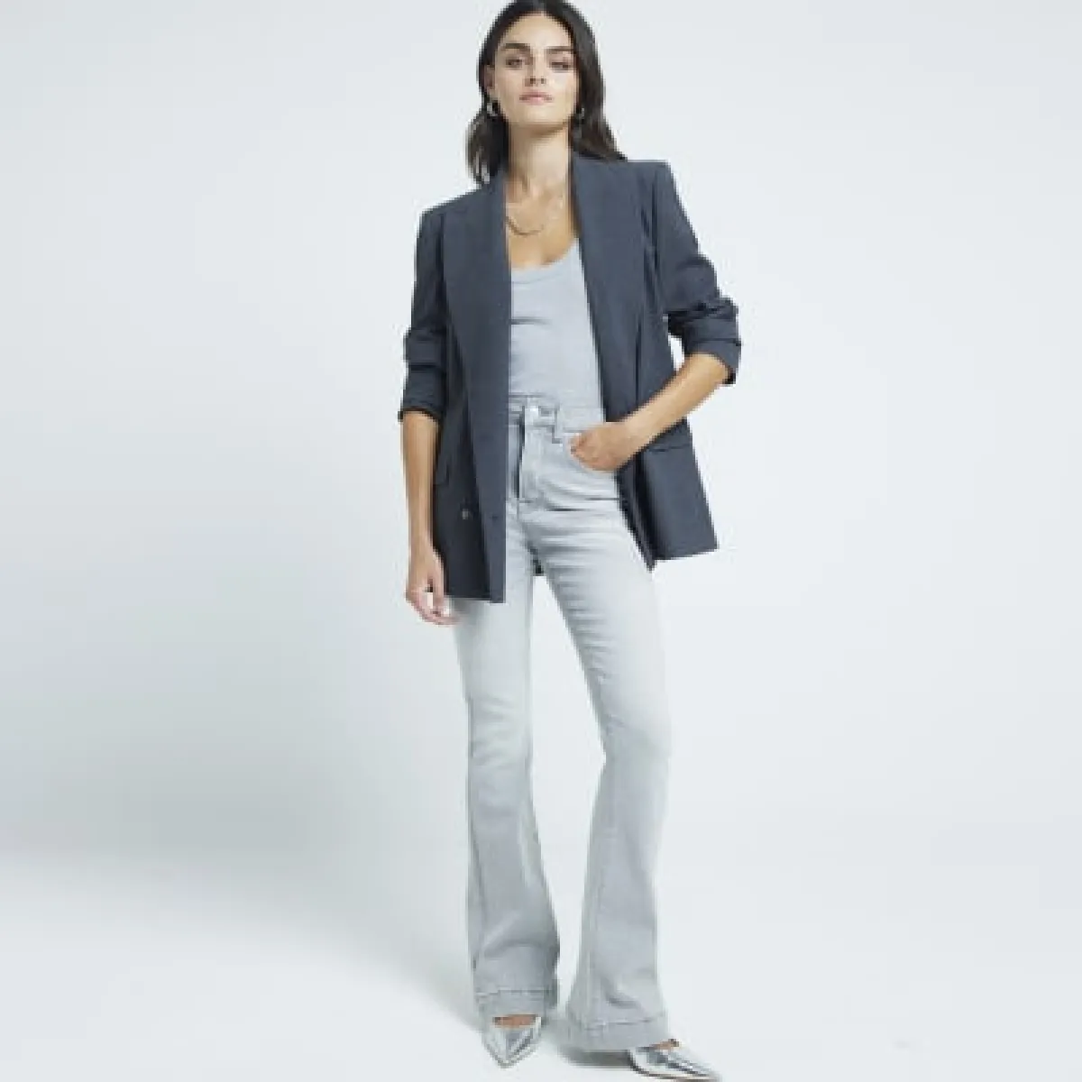 Grey high waisted flare jeans sold by River Island