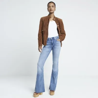 Blue low rise flared jeans sold by River Island