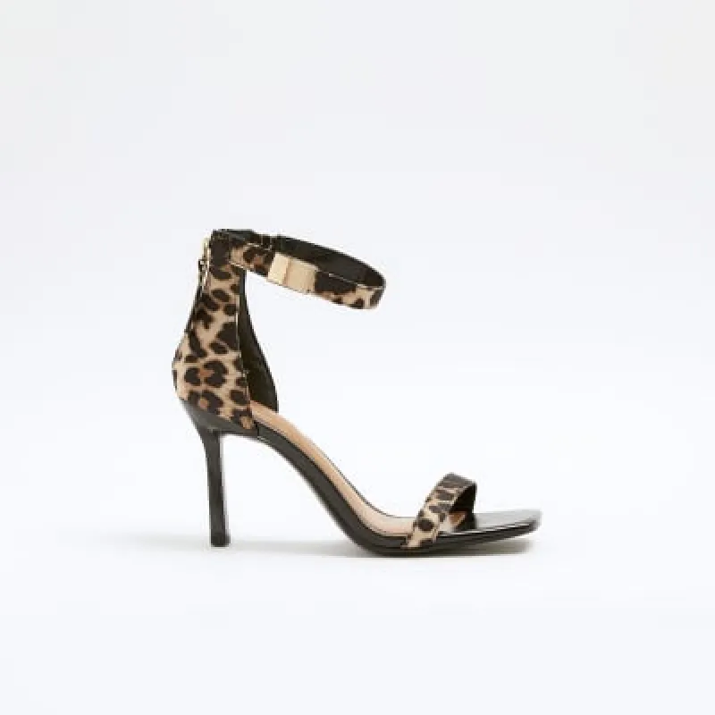 Beige leopard clasp strap heeled sandals sold by River Island