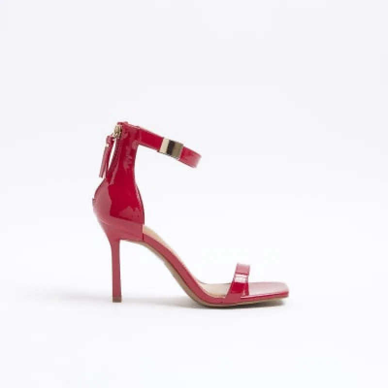 Red patent clasp strap heeled sandals sold by River Island