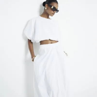 White bubble hem crop top sold by River Island