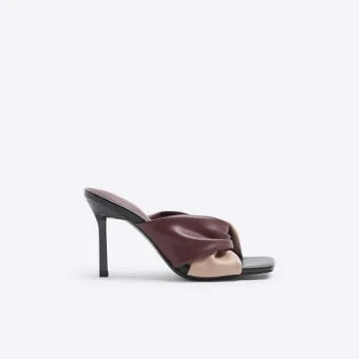 Pink twist heeled mule sandals sold by River Island