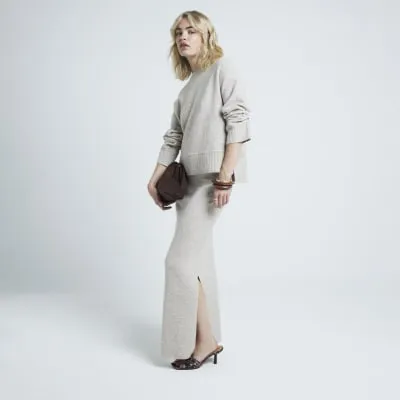 Beige knit maxi skirt sold by River Island