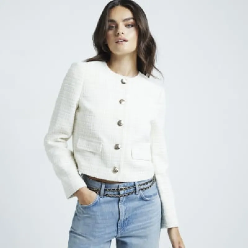 Cream boucle crop trophy jacket sold by River Island