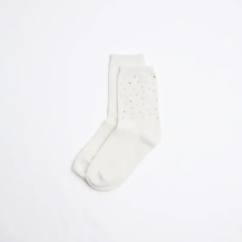 Cream pearl embellished socks sold by River Island