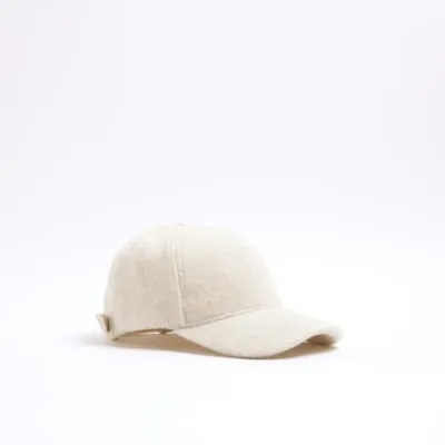 Cream textured cap sold by River Island