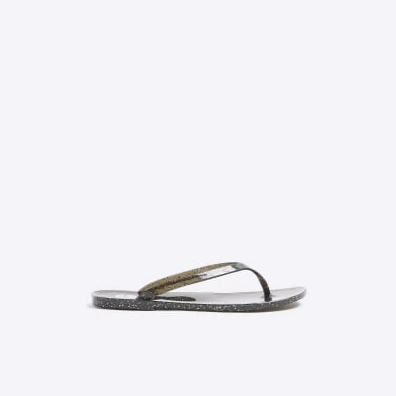 Black JuJu metallic jelly flip flop sandals sold by River Island