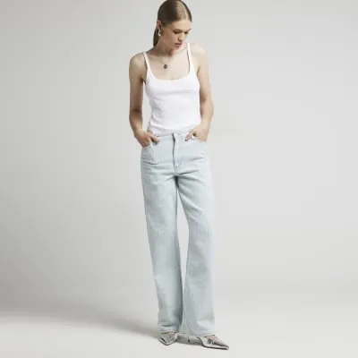 White ribbed scoop back cami top sold by River Island