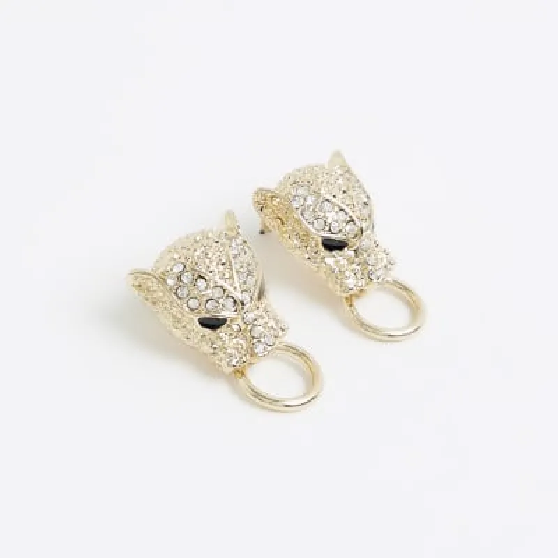 Gold leopard head stud earrings sold by River Island