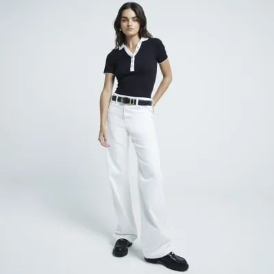 Black ribbed scallop trim polo top sold by River Island