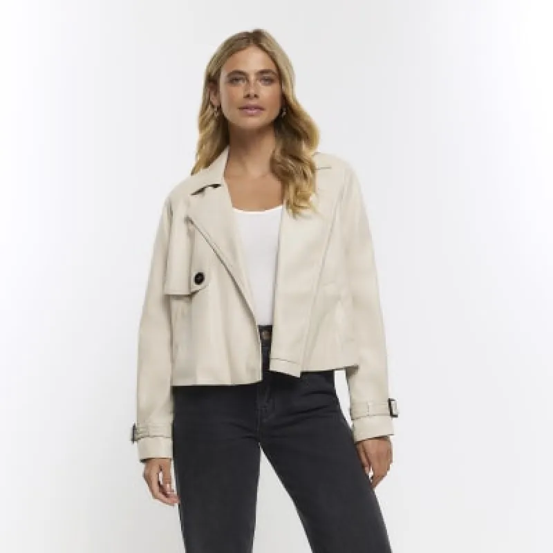 Cream faux leather crop trench coat sold by River Island