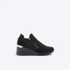 Black slip on wedge trainers sold by River Island