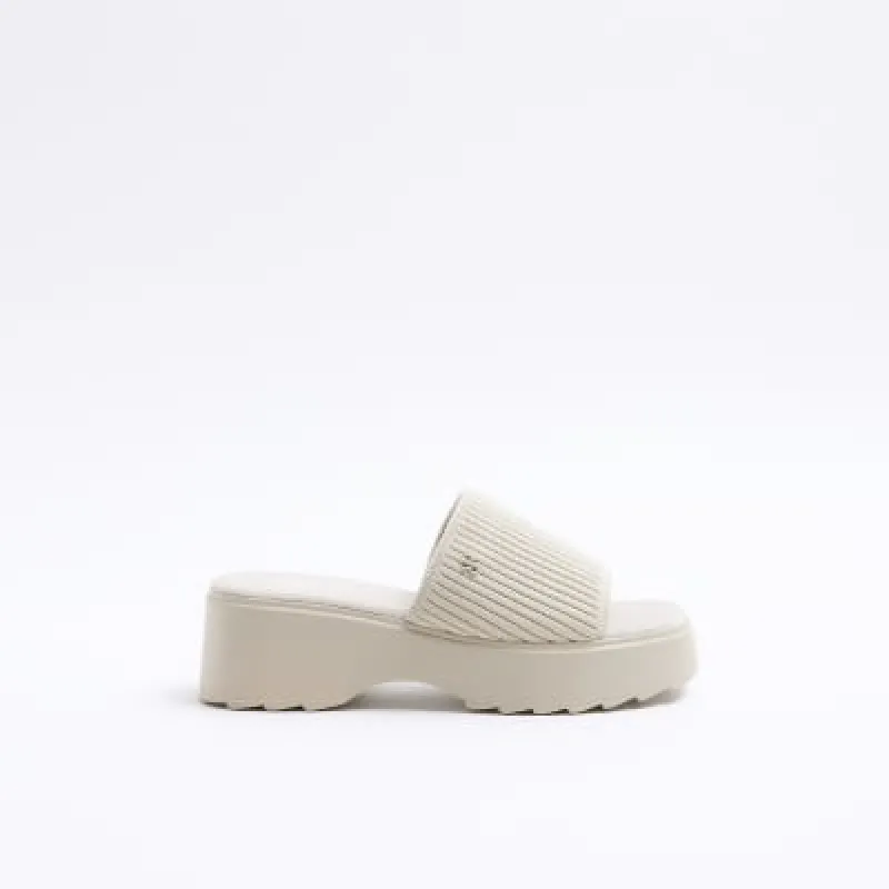 Beige knit flatform sandals sold by River Island