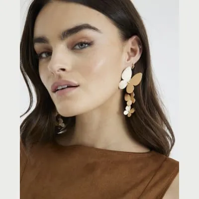 Gold Butterfly Cascade Earrings sold by River Island