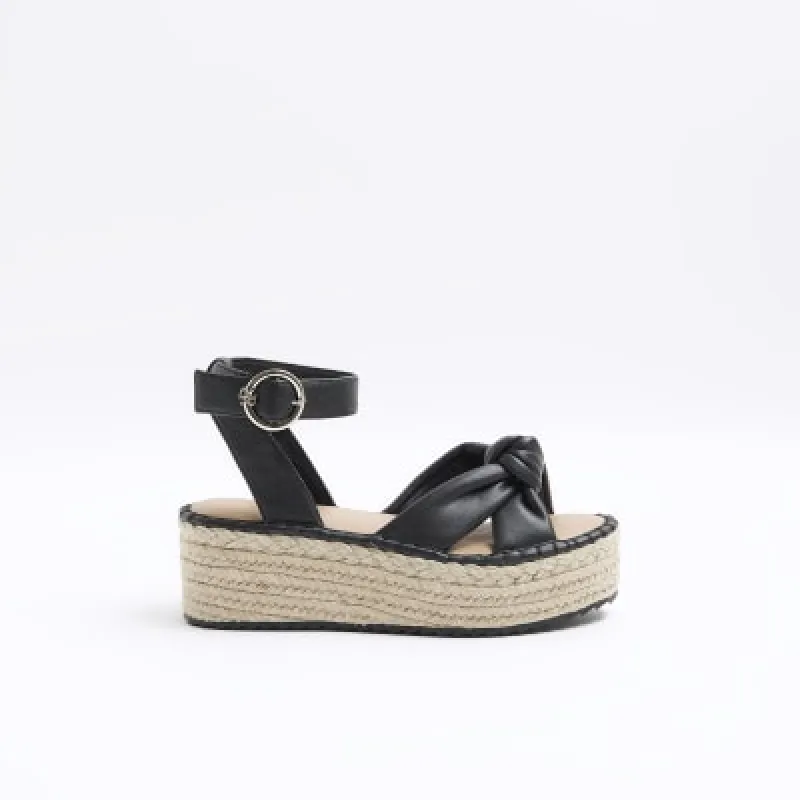 Black flatform espadrille sandals sold by River Island
