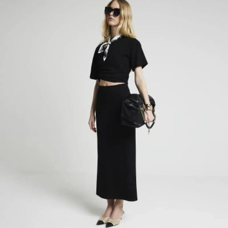 Black  midi skirt sold by River Island