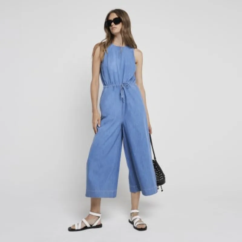Blue denim crop jumpsuit sold by River Island