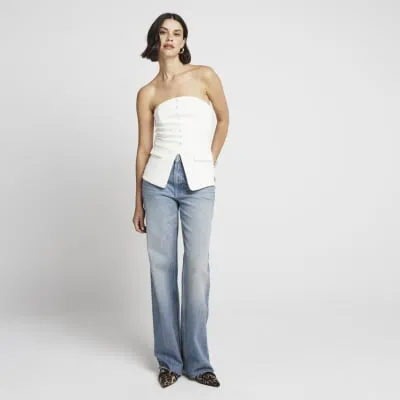 Cream button bandeau waistcoat sold by River Island