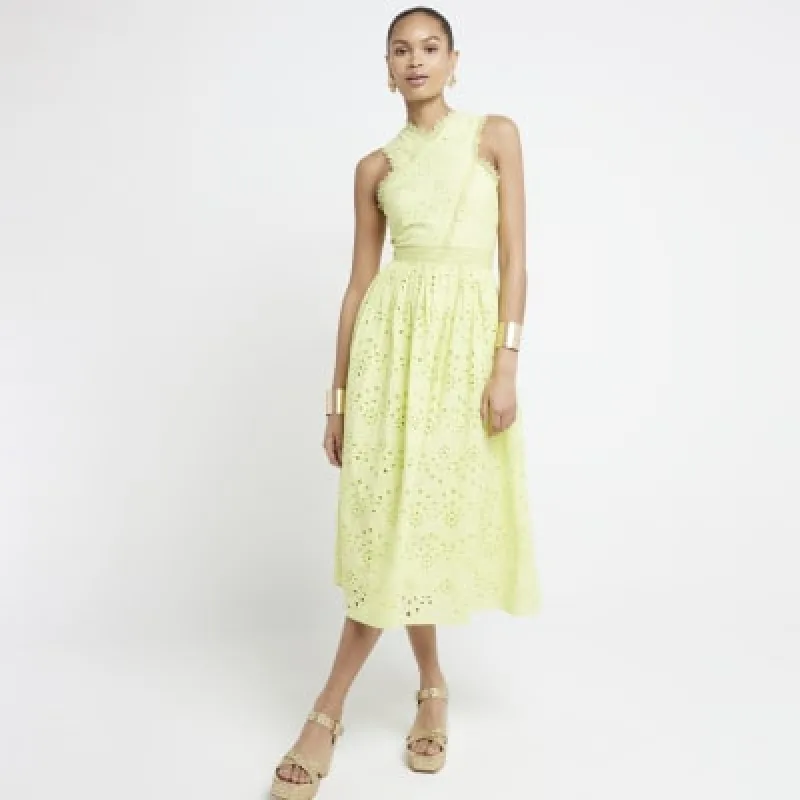 Green broderie cross neck smock midi dress sold by River Island