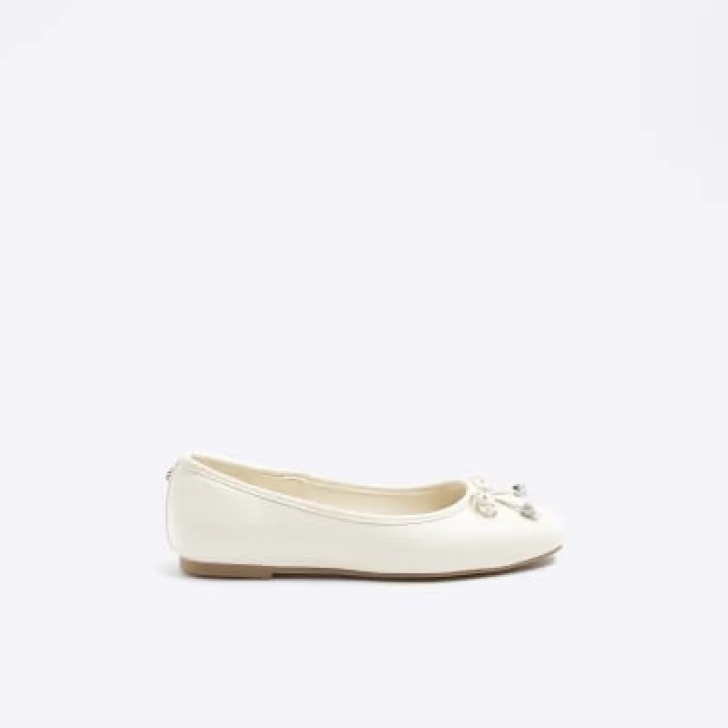 Cream bow detail ballet pumps sold by River Island