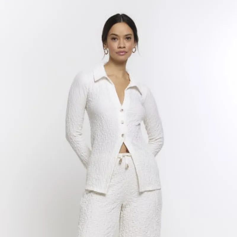 Cream textured long sleeve shirt sold by River Island