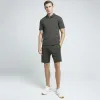 Khaki slim fit textured half zip polo sold by River Island