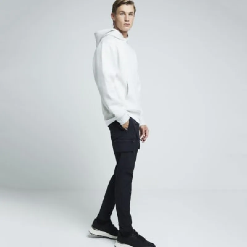 Black skinny fit cargo trousers sold by River Island