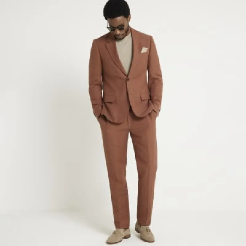 Rust slim fit linen blend suit trousers sold by River Island