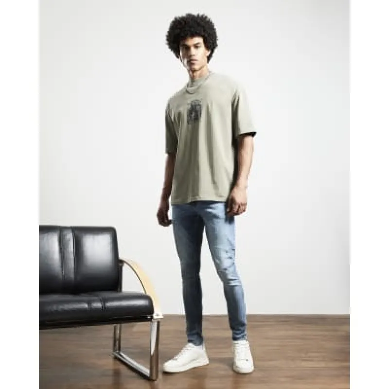Blue ripped spray on skinny jeans made by River Island