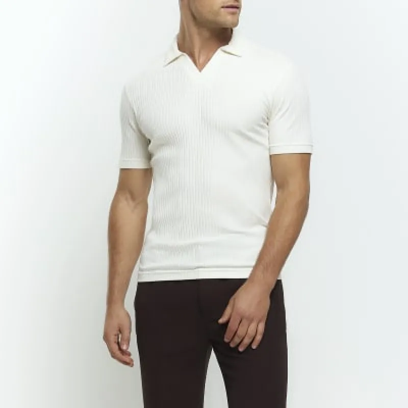 Beige muscle fit rib open collar polo sold by River Island