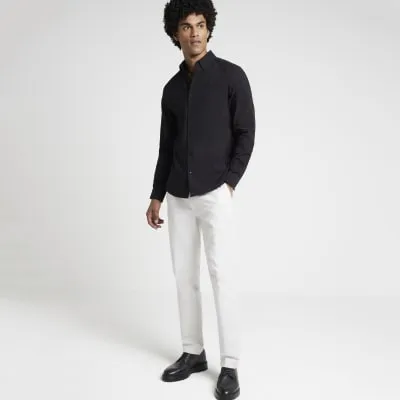 Black muscle fit textured shirt sold by River Island