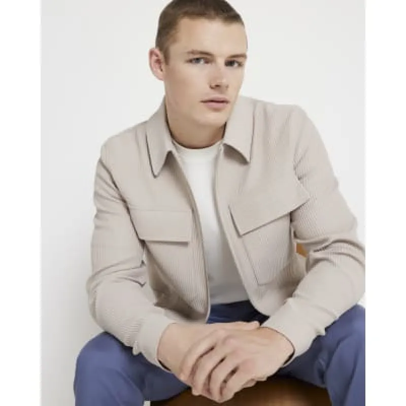 Beige regular fit plisse zip up overshirt sold by River Island
