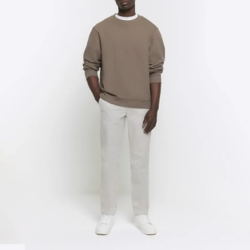 Grey slim fit chino trousers sold by River Island