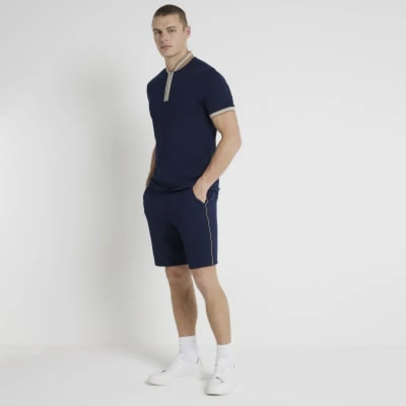 Navy slim fit textured shorts sold by River Island