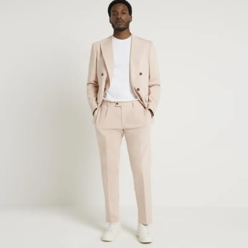 Pink slim fit suit trousers sold by River Island