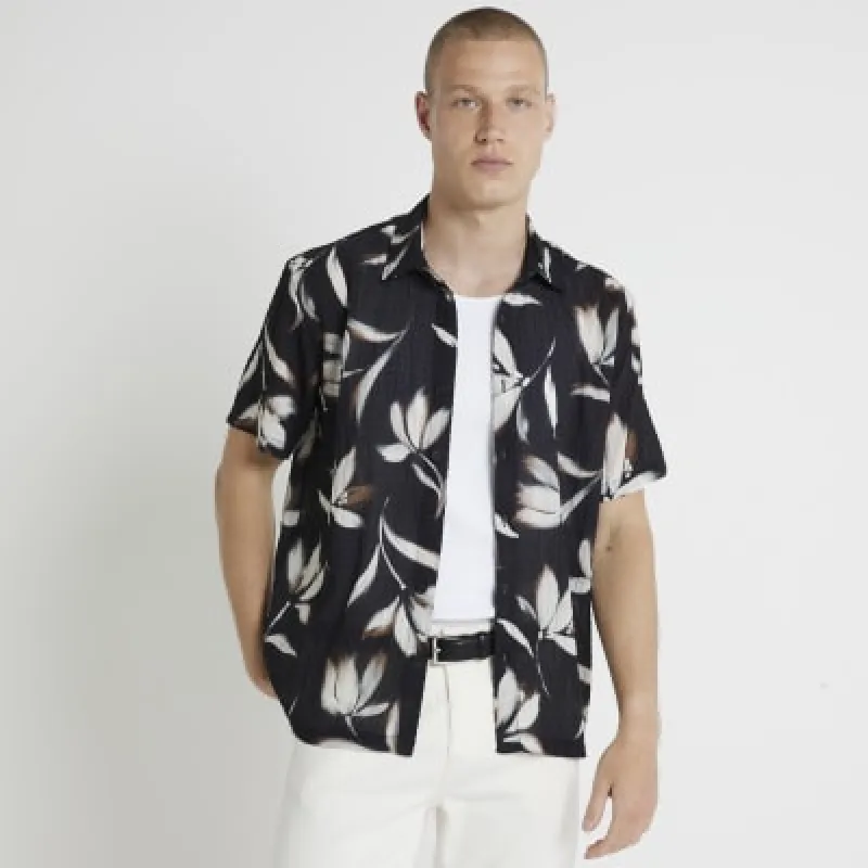 Black regular fit floral shirt sold by River Island