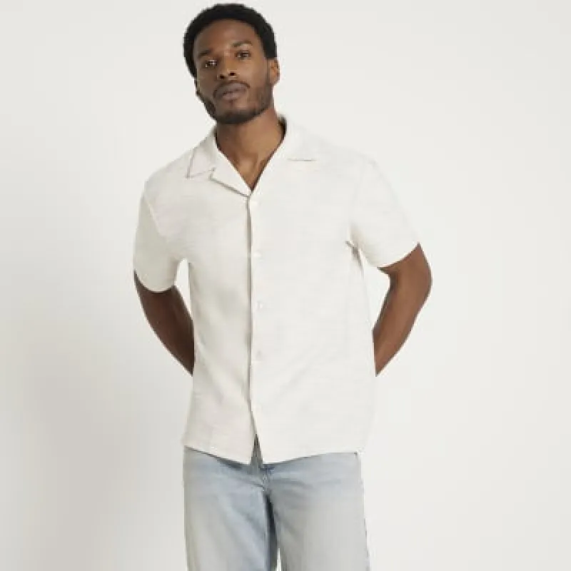 Stone regular fit textured revere shirt sold by River Island