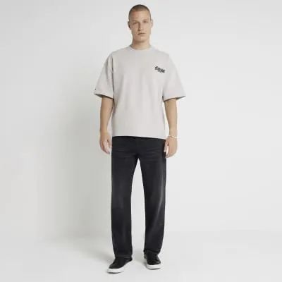 Washed black loose fit jeans sold by River Island