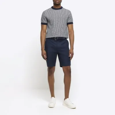 Navy slim fit belted chino shorts sold by River Island
