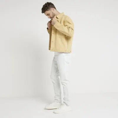 Yellow oversized fit denim jacket sold by River Island