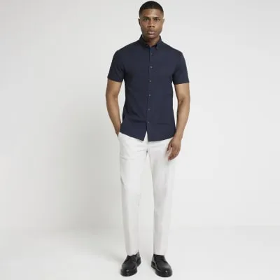 Navy muscle fit textured smart shirt sold by River Island