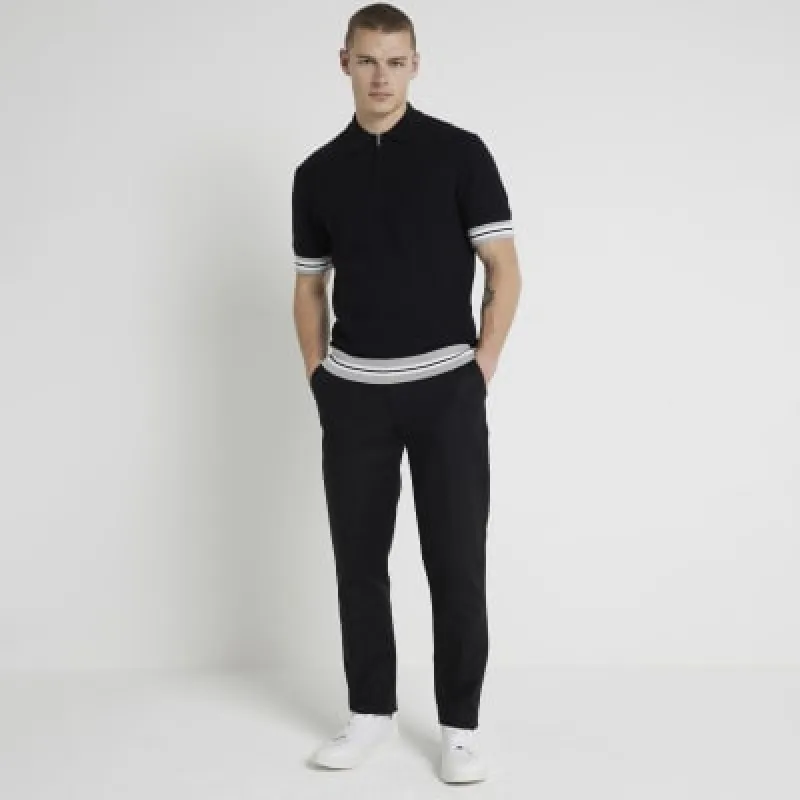 Black slim fit knitted polo shirt sold by River Island