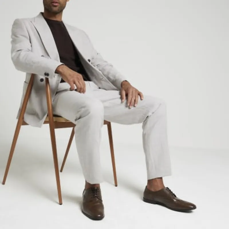 Brown lace up leather brogue derby shoes sold by River Island