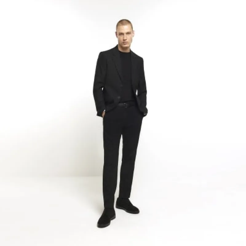 Black skinny fit suit trousers sold by River Island