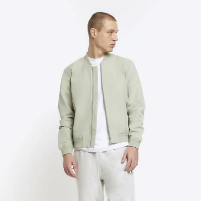 Green regular fit zip up bomber jacket sold by River Island