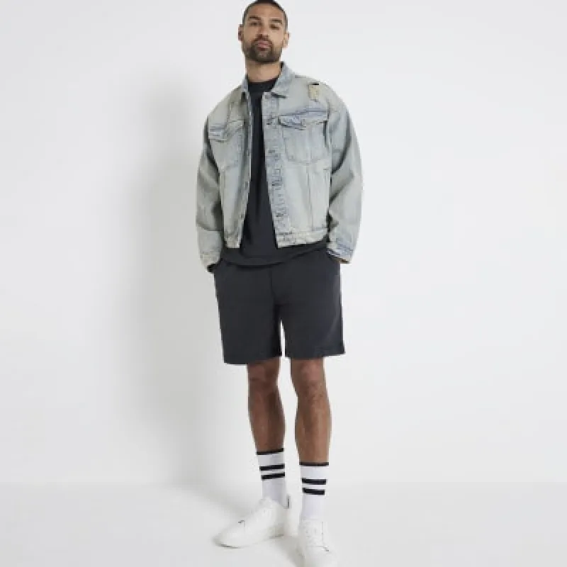 Washed black regular fit loopback shorts made by River Island