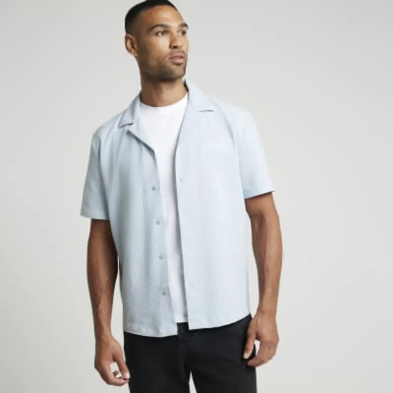Blue regular fit embroidered revere shirt sold by River Island