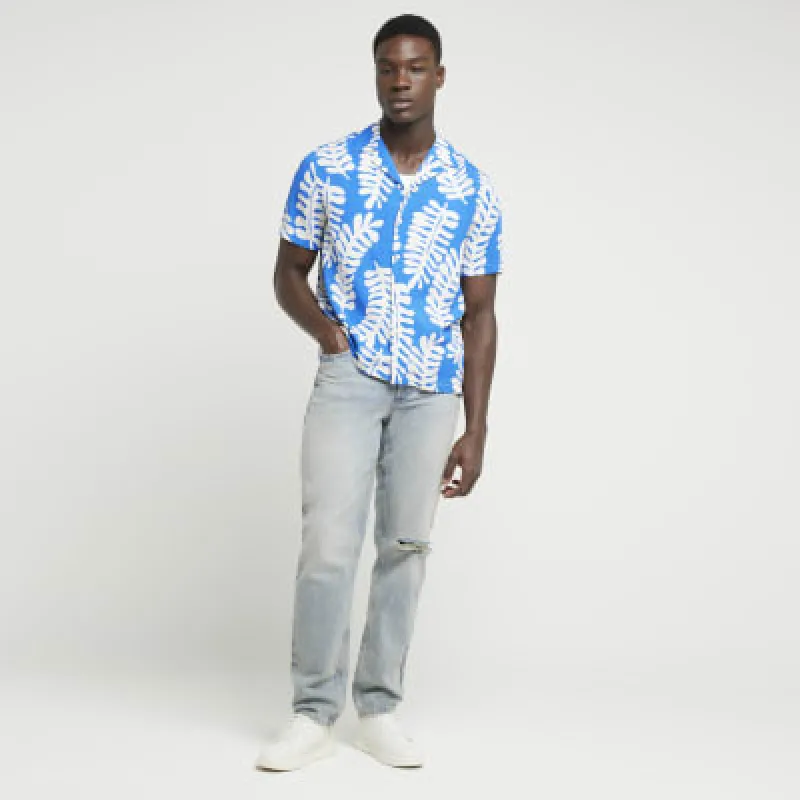 Blue regular fit tropical leaf shirt sold by River Island