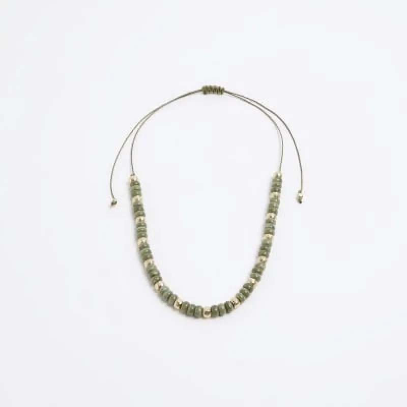 Green beaded necklace sold by River Island